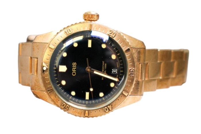 ORIS Diver 青銅潛水錶實物圖，具備旋轉錶圈與夜光刻度